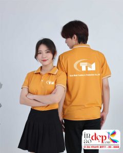In áo phông màu cam Công ty Tuan Minh Trading & Production